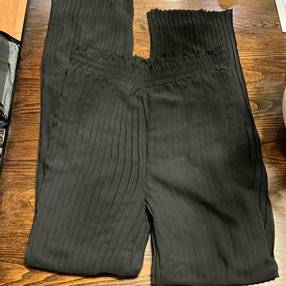 Black pleated flowy pants